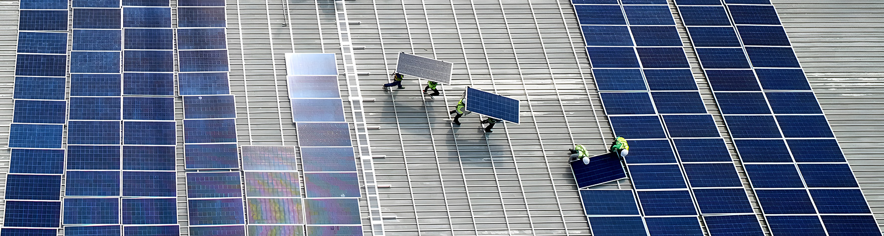 Aerial,View,Of,Photovoltaic,Solar,Panels,Installation,Work,Activity,At
