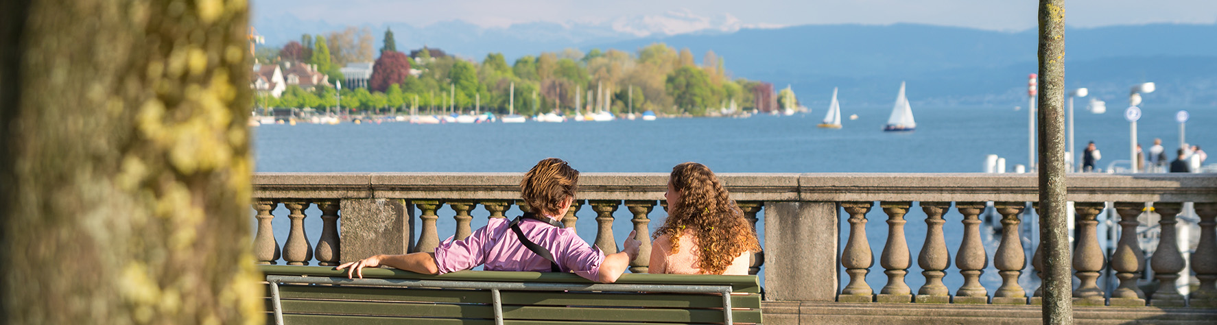 Couple,On,Bench,At,Lakeside,Zurich